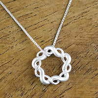 Sterling silver pendant necklace, 'Infinity Twine' - Sterling Silver Pendant Necklace Handmade in Thailand