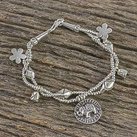 Silver beaded charm bracelet,