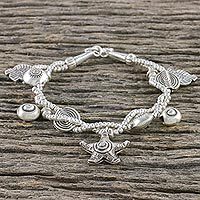 Silver beaded charm bracelet,