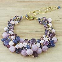 Gold plated multi-gemstone charm bracelet,