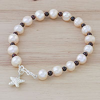 Cultured pearl and garnet beaded bracelet, 'Starfish Love' - Beaded Cultured Freshwater Pearl Garnet Starfish Bracelet