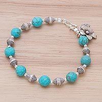 Silver beaded charm bracelet,