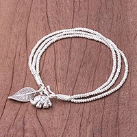 Silver beaded charm bracelet,