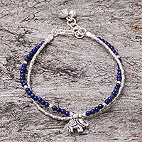 Lapis lazuli beaded bracelet, 'Deep Blue Elephant' - Elephant and Floral Lapis Lazuli Beaded Bracelet