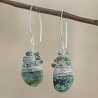 Silver accented reconstituted turquoise dangle earrings,