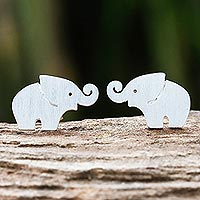 Sterling silver stud earrings, 'Curled Trunks' - Sterling Silver Elephant Stud Earrings with Curled Trunks