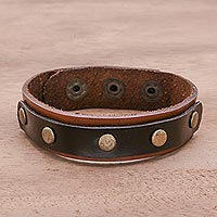 Leather wristband bracelet, 'Striking Studs' - Black and Brown Studded Leather Wristband Bracelet