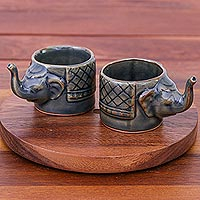 Celadon ceramic teacups, 'Elephant Essence in Brown' (pair) - Handmade Brown Celadon Ceramic Elephant Teacups (Pair)