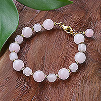 Rose quartz and hematite beaded bracelet, 'Blushing' - Handcrafted Rose Quartz Bracelet with Hematite