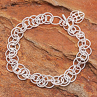Sterling silver link bracelet, 'Global Heart' - Modern Sterling Silver Link Bracelet with Heart Charm