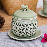 Celadon ceramic teacup set, 'Triumphant Elephant' - Green Celadon Ceramic Teacup Set with Saucer Strainer & Lid