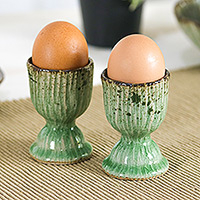 Celadon ceramic egg cups, 'Green Treats' (pair) - Lotus-Themed Crackled Green Celadon Ceramic Egg Cups (Pair)