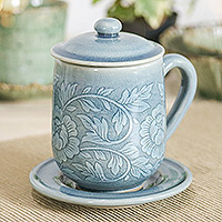 Celadon ceramic lidded cup and saucer, 'Luxury Peony in Blue' - Classic Crackled Blue Celadon Ceramic Covered Cup and Saucer