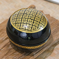 Wood decorative box, 'Thai Richness' - Lacquered Lanna Patterned Round Mango Wood Decorative Box
