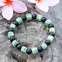 Zoisite and onyx beaded stretch bracelet, 'Dual Flair' - Handcrafted Zoisite and Black Onyx Beaded Stretch Bracelet
