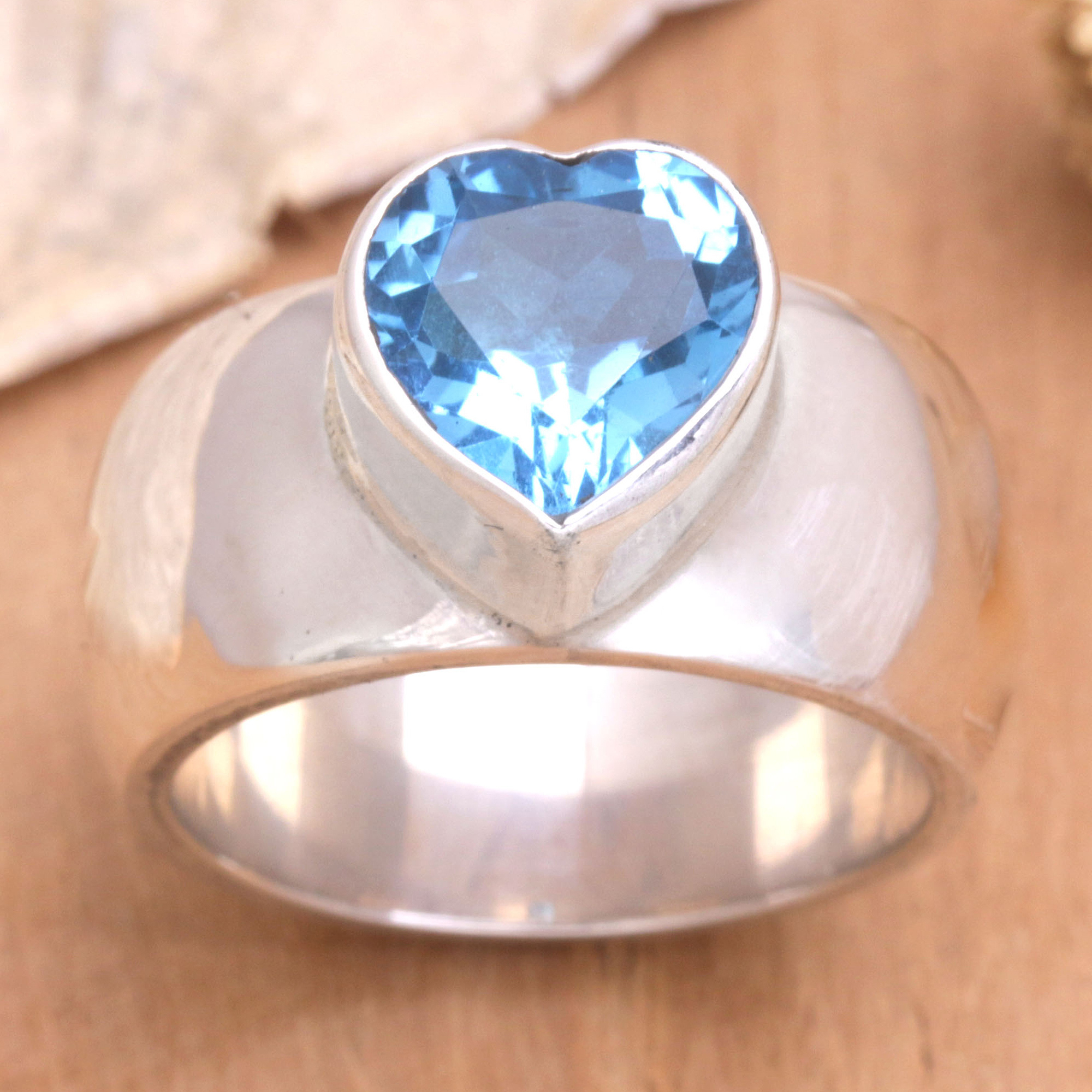 Heart Shaped Sterling Silver and Blue Topaz Ring, 'Heart Voice'