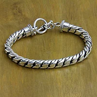 Sterling silver braided bracelet, 'Strength and Valor' - Sterling Silver Chain Bracelet