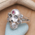 Men's garnet ring, 'Pirate's Jewel' - Men's Handcrafted Silver Skull RIng