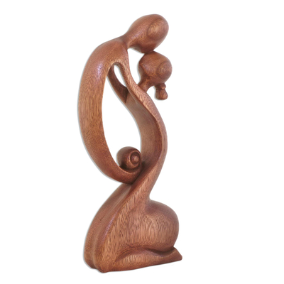 Wood sculpture, 'A Mother's Kiss' - Suar Wood Family Sculpture