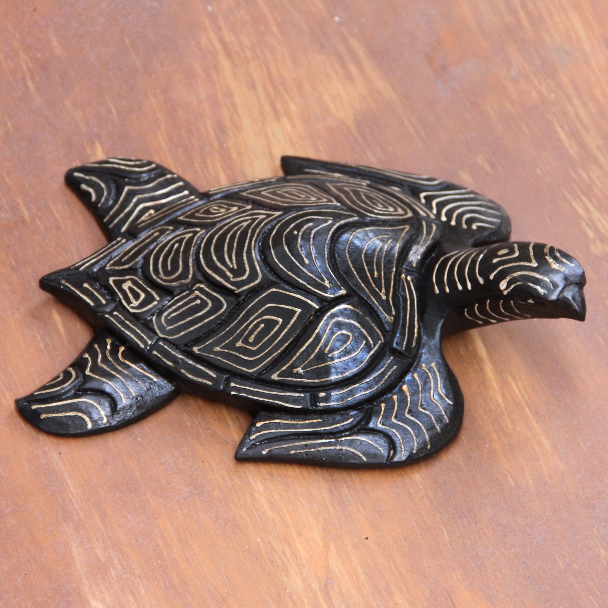 wooden sea turtle sculpture