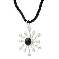 Onyx pendant necklace, 'Black Star' - Handcrafted Sterling Silver and Onyx Pendant Necklace