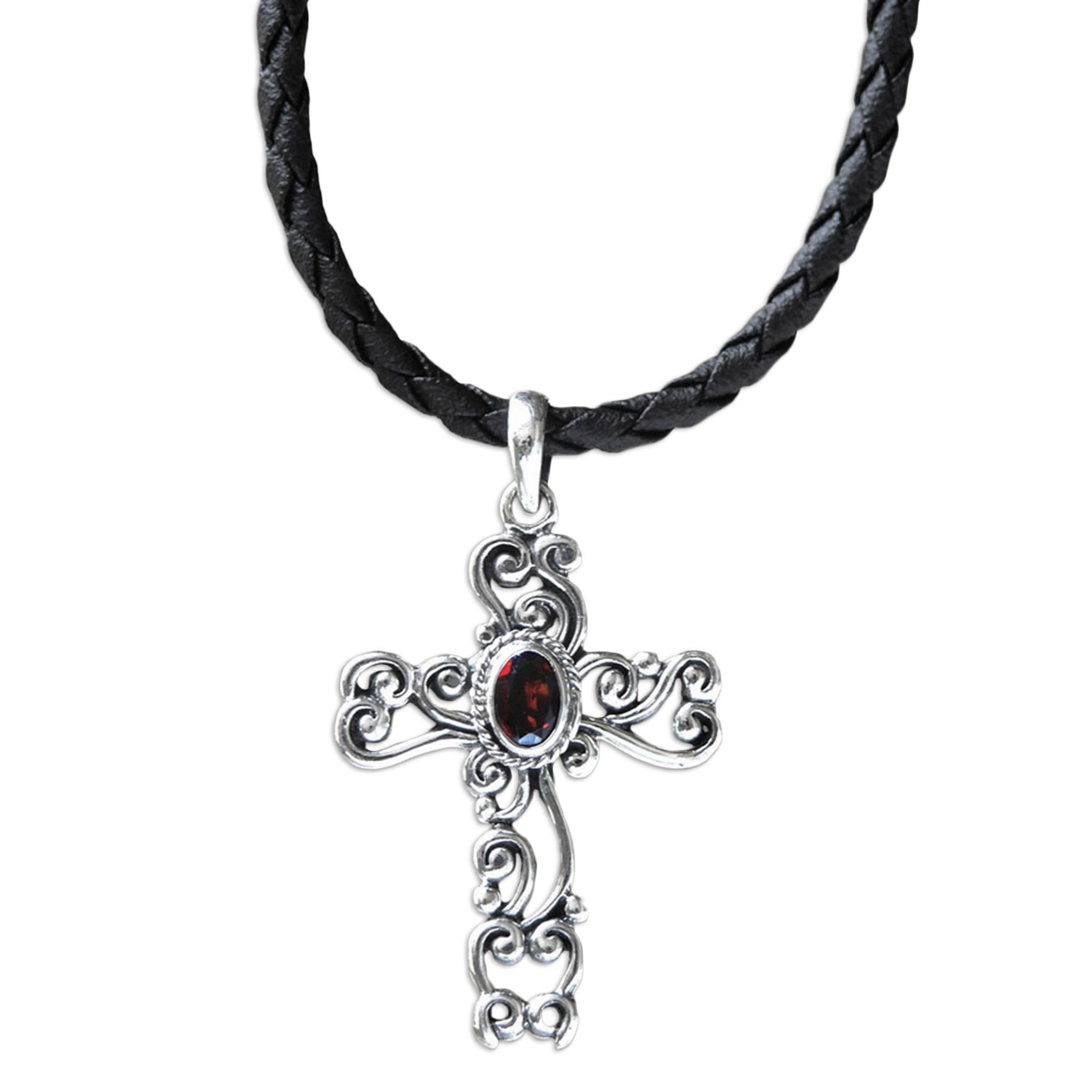 Sterling Silver and Garnet Religious Necklace - Balinese Cross | NOVICA