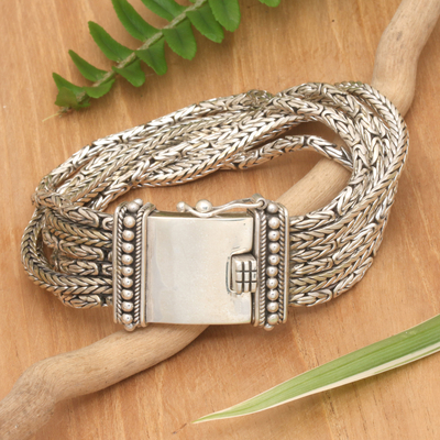 Sterling silver braided bracelet, 'Embrace Unity' - Sterling Silver Wristband Bracelet 