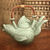 Stoneware teapot, 'Green Fish Legend' - Stoneware teapot
