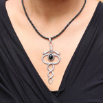 Onyx pendant necklace, 'Twin Serpents' - Sterling Silver and Onyx Snake Necklace from Indonesia