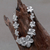 Charm bracelet, 'Frangipani Glam' - Women's Floral Sterling Silver Link Bracelet (image 2) thumbail