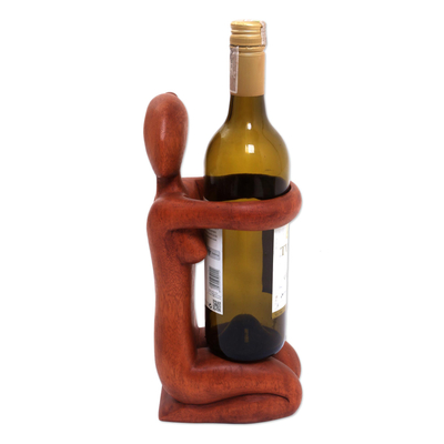 Wood wine bottle holder, 'The Offering' - Hand Carved Suar Wood Wine Bottle Holder