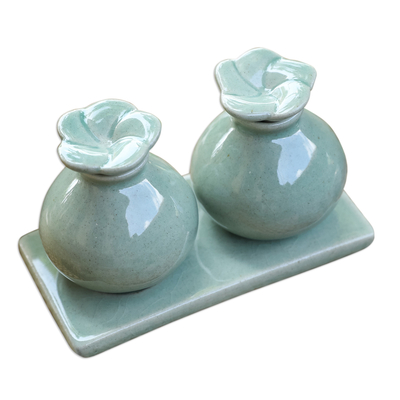 Ceramic oil bottles, 'Jade Bali Frangipani' - Ceramic oil bottles