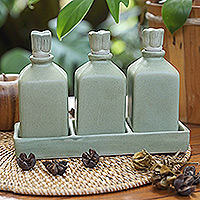 Ceramic oil bottles, 'Jade Bali Lotus' (set of 3) - Green Ceramic Oil Bottles (Set of 3)