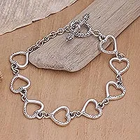 Sterling Silver heart bracelet, 'Story of Love' - Silver Bracelet Featuring Stamped Hearts