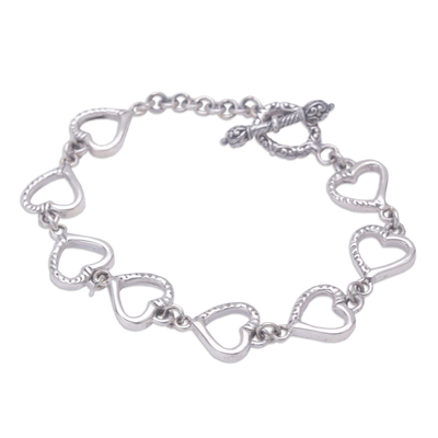 Sterling Silver heart bracelet, 'Story of Love' - Sterling Silver heart bracelet