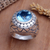 Men's sterling silver ring, 'Blue Ocean' - Men's Sterling Silver and Blue Topaz Ring thumbail
