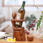 Wood wine bottle holder, 'Embrace' - Hand Carved Nude Figure Wine Bottle Holder
