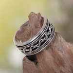 Sterling silver spinner ring, 'Knots' - Artisan Jewelry Sterling Silver Spinner Ring