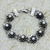 Pearl flower bracelet, 'Sacred Lotus' - Silver and Pearl Lotus Bracelet Artisan Crafted Jewelry (image 2) thumbail