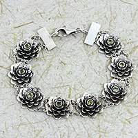 Peridot flower bracelet, 'Sacred Green Lotus' - Fair Trade Silver and Peridot Floral Link Bracelet