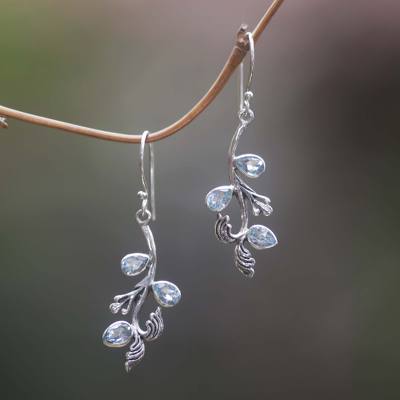 Blue topaz floral earrings, 'Bali Belle' - Blue Topaz Sterling Silver Dangle Earrings