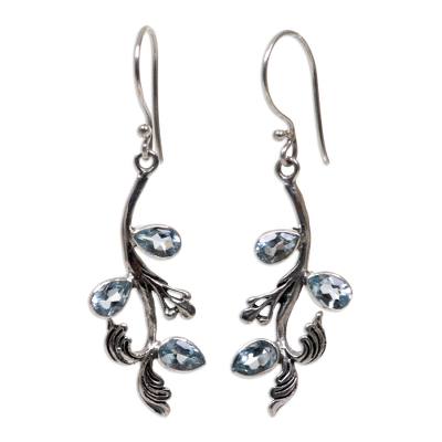Blue topaz floral earrings, 'Bali Belle' - Blue Topaz Sterling Silver Dangle Earrings