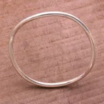 Sterling silver bangle bracelet, 'Simplicity in the Round' - Polished Round Sterling Silver Bangle Bracelet