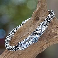 Blue topaz braided bracelet, 'Meditate' - Men's Braided Sterling Silver and Blue Topaz Bracelet