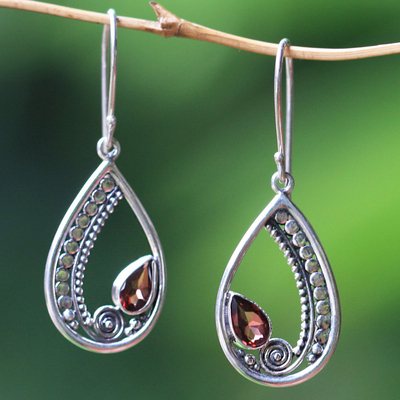 Garnet dangle earrings, 'Paisley Swirl' - Sterling Silver Garnet Dangle Earrings from Indonesia
