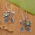 Peridot flower earrings, 'Bali Daisy' - Handcrafted Indonesian Sterling Silver Dangle Earrings