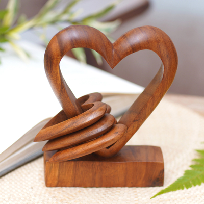 Wood sculpture, 'Heart Power' - Hand Carved Suar Wood Romantic Sculpture