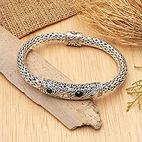 Men's onyx braided bracelet, 'Splendid Dragon' - Men's Sterling Silver Handmade Bracelet