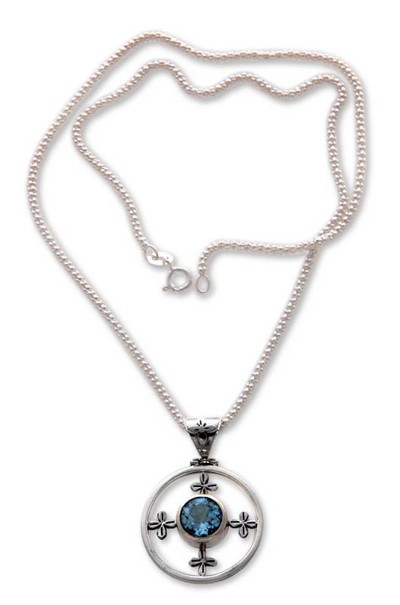 Blue topaz pendant necklace, 'Around the World' - Blue topaz pendant necklace
