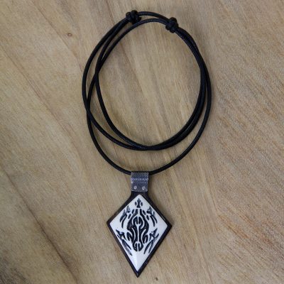 Ebony wood and bone pendant necklace, 'Turtle Protection' - Handmade Ebony Wood and Bone Pendant on Cord Necklace